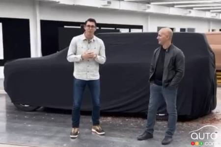 RJ Scaringe and Jeff Hammoud with the future Rivian R2