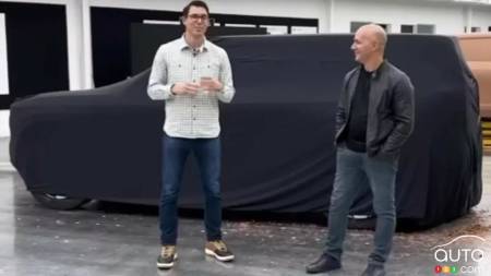 RJ Scaringe and Jeff Hammoud with the future Rivian R2