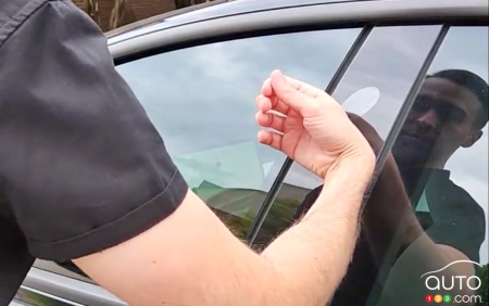 Brandon Dalaly unlocking his Tesla... with his hand