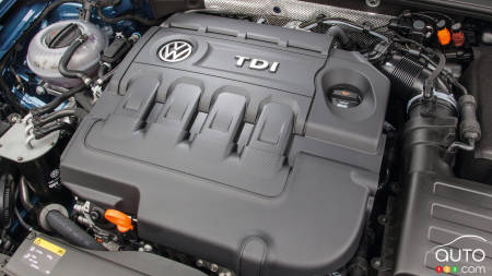 Volkswagen hit with another lawsuit, delays financial results