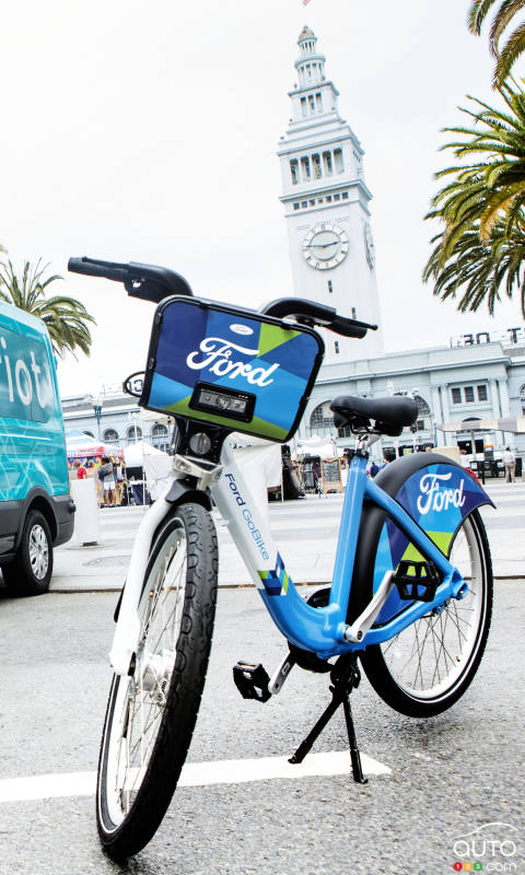 Ford launches GoBike, acquires Chariot shuttle service