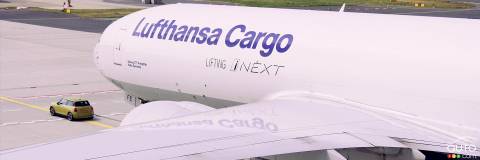 An Electric Mini Tows a Boeing 777