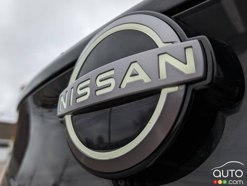 The Nissan logo on the Ariya