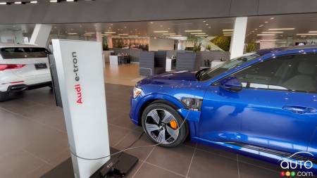 Audi e-tron charging at a Baxter Auto Group dealership