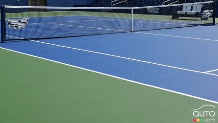 Netting at the US Open with Cadillac logos