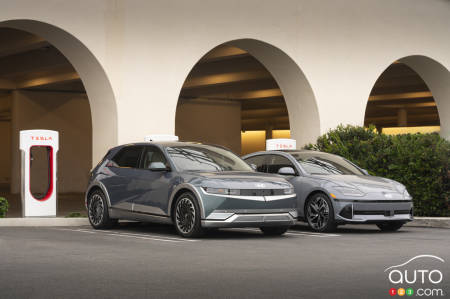 EVs at a Tesla charging station