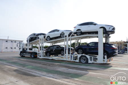 Vehicles leaving the Takoaka plant in Japan