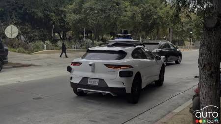 A Waymo taxi on the road in Los Angeles