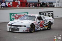 L.P. Dumoulin, WeatherTech Canada/Bellemare Dodge as he is waved the checkered flag race