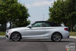 2015 BMW 228i xDrive Cabriolet side view with top on