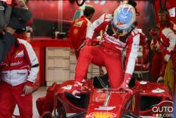 Ferrari's Felipe Massa climbs out of his car.