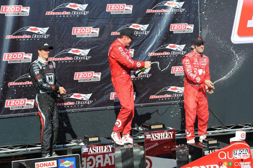 Sebastien Bourdais, Dragon Racing, Scott Dixon, Target Chip Ganassi Racing and Dario Franchitti, Target Chip Ganassi Racing during podium ceremony of race 1