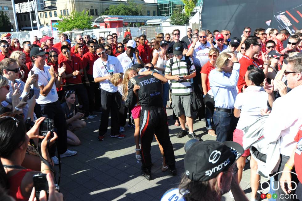 Sebastien Bourdais, Dragon Racing hugs wife and kids