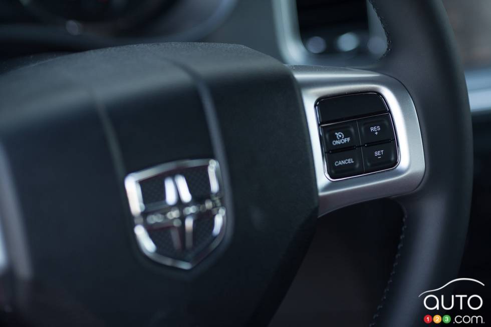 Steering wheel-mounted cruise controls