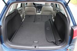 Trunk with folding rear seat