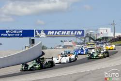 The Green Flag drops as the ALMS field passes the start/finish line.