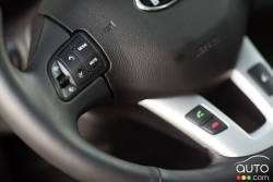 Steering wheel-mounted audio and Bluetooth controls