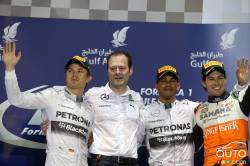 Nico Rosberg, Mercedes GP and Aldo Costa, Mercedes GP engineer on podium with Lewis Hamilton, Mercedes GP and Sergio "Checo" Perez, Force India F1 Team.