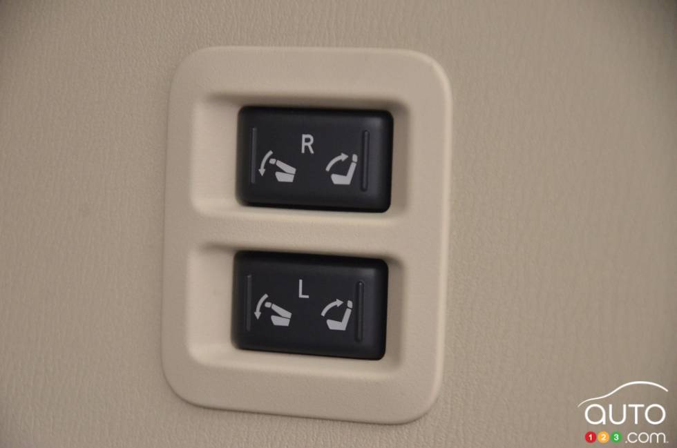 Button for lowering seats