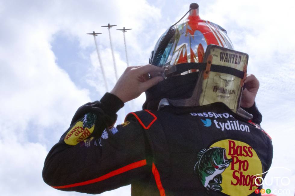 Ty Dillon, Chevrolet Bass Pro Shops - Tracker Boats watches as planes fly-by priro to the race