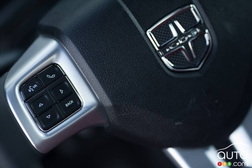 Steering wheel-mounted Bluetooth controls