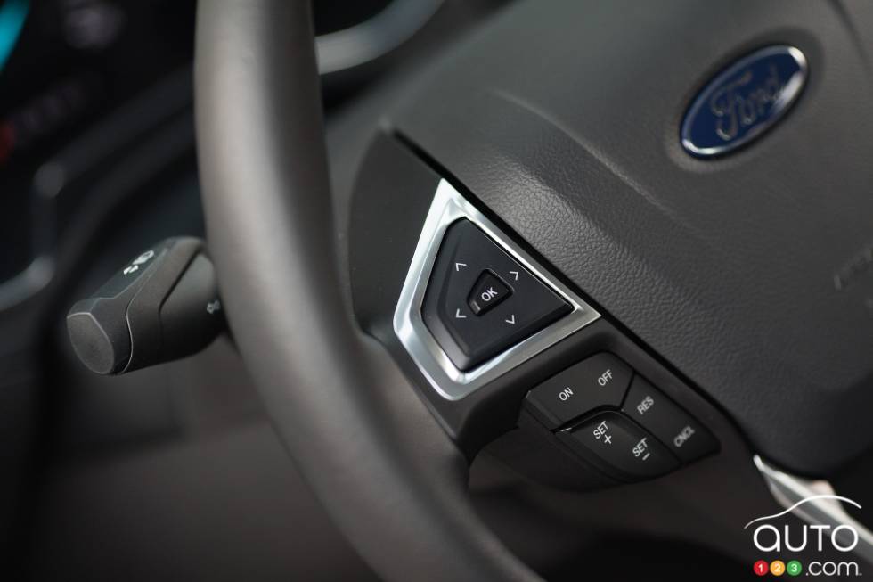 Steering wheel controls on the left