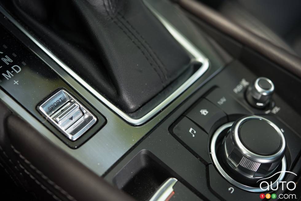 Boutton de contrôle des modes de conduite