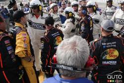 NASCAR officials make sure to separate the crews of Chase Elliott, Chevrolet Aaron's Dream Machine / Hendrickcars.com and Ty Dillon, Chevrolet Bass Pro Shops - Tracker Boats as tempers were flaring after the race