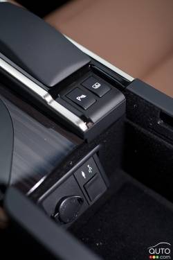 Power outlet and auxiliary input jack in the centre console