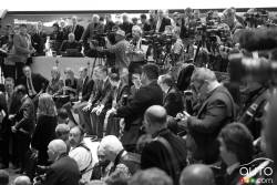 members of the media gather before the NIssan press conference