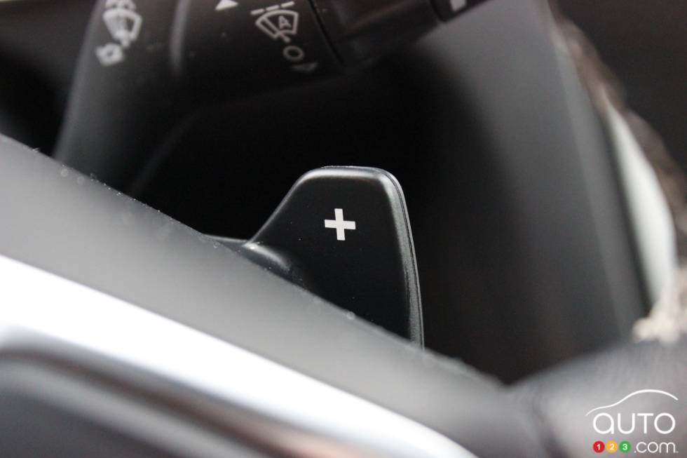 Wheel-mounted paddle shifters