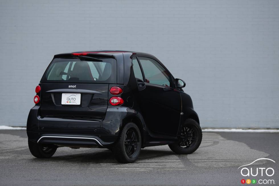 Right rear 3/4 view, wheels turned