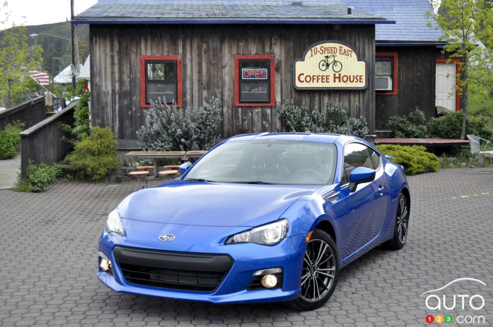 Front 3/4 view, blue model with the wheels turned