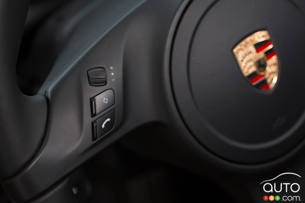 Steering wheel-mounted Bluetooth controls on the left