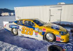 This is the Charlotte Special,  a 2010 NASCAR Nationwide car with a 358 cu. in. Chevy SB2 V-8. The car is owned and driven by Robert Blakey of Houston Texas.