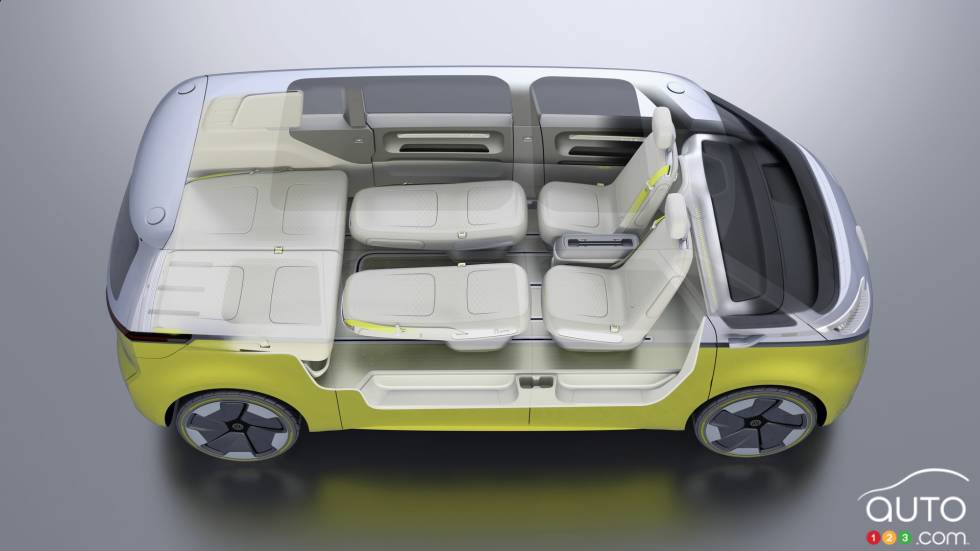 Interior with front seats to the rear and center seats unfolded completely