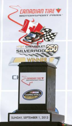 Silverado 250 trophy in victory lane