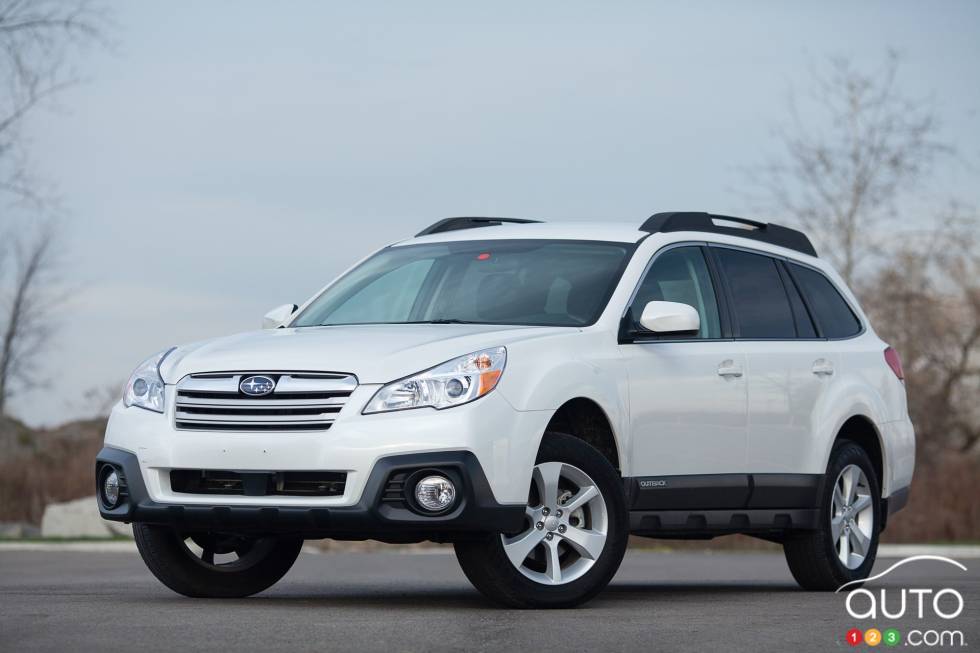 Left front 3/4 view, wheels turned