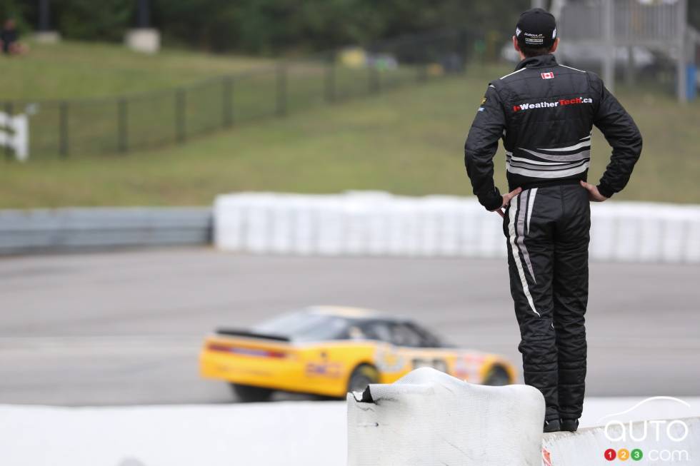 L.P. Dumoulin, WeatherTech Canada/Bellemare Dodge watches the other cars before his qualifying session